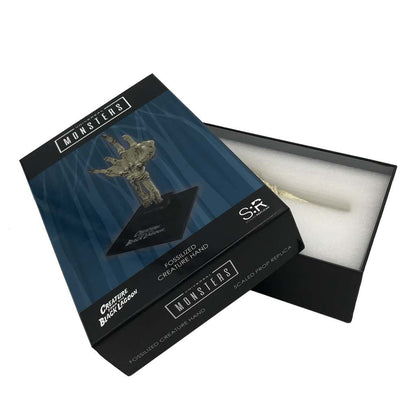 UM FOSSIL CREATURE HAND SCALED PROP REPL