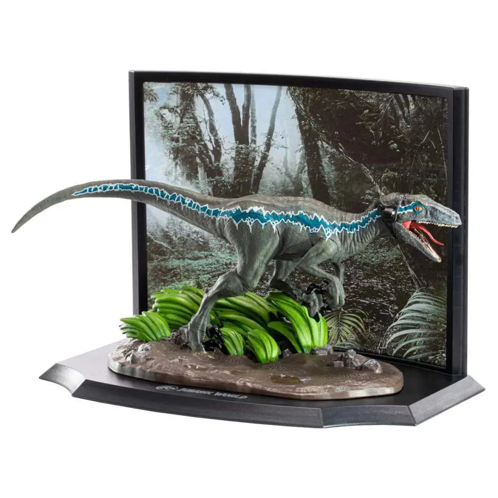 NOBLE COLLECTIONS JURASSIC PARK VELOCIRAPTOR BLUE DIORAMA 19 cm